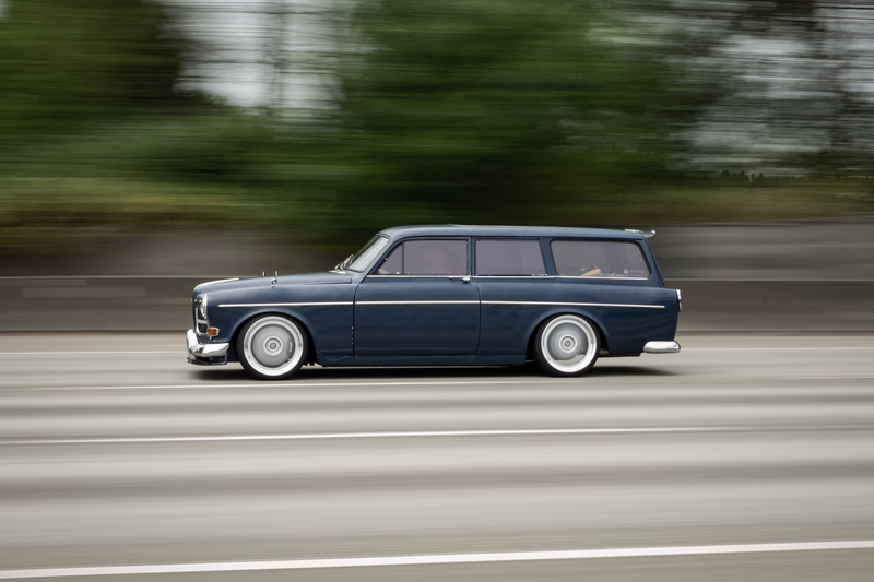 Illustration for article titled True Hero Swapped A Volvo Amazon Wagon Body Onto A BMW E30 In His Driveway
